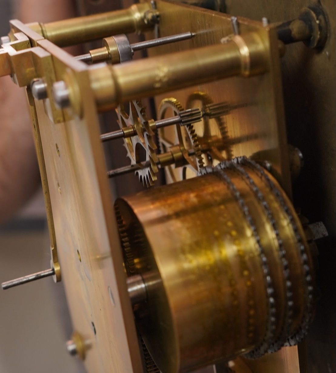 A GWR drop dial railway wall timepiece with fusee movement in a mahogany case, painted 12” dial with ‘shirt button’ GWR monogram and an ivorine plaque pinned to the lower left side of the case engraved with ‘GWR 3746’